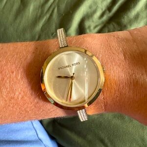Lightly used MK bangle watch but hook might need fixed/ adjusted